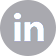 LinkedIn logo featuring in white lettering within a grey circular icon.