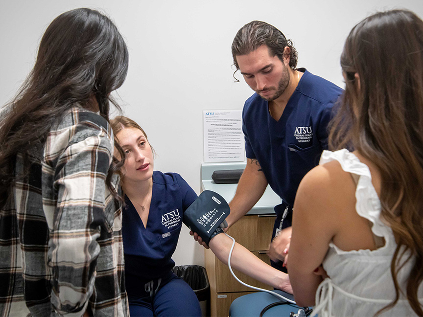 Students helping patients