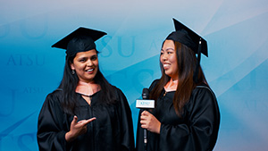 Two students smiling